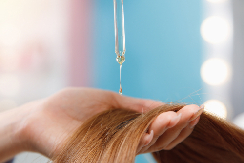manfaat minyak kemiri mencegah kerontokan rambut
