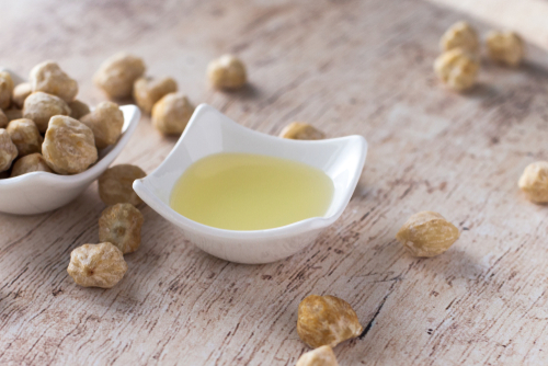 manfaat minyak kemiri untuk menjaga kulit